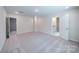 Spacious loft area with carpeting and neutral paint at 22 Porter Nw St # Sw22, Concord, NC 28027