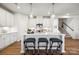 Bright kitchen with white cabinets, quartz countertops, and pendant lighting above island at 888 Exeter Dr, Sherrills Ford, NC 28673