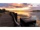 Scenic sunset view over a calm lake, seen from a wooden dock at 888 Exeter Dr, Sherrills Ford, NC 28673