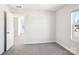 Bedroom with window and door to another room at 1236 31St St, Hickory, NC 28613