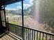 A screened porch overlooks a natural area at 5106 Silver Trace Ln # 90, Denver, NC 28037