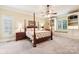 Spacious bedroom with built-in shelves and a charming window seat at 7025 Willow Trace Ln, Weddington, NC 28104