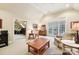 Spacious bonus room with vaulted ceiling, fireplace, and office area at 7025 Willow Trace Ln, Weddington, NC 28104