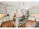 Bright kitchen with custom cabinetry and breakfast bar at 7025 Willow Trace Ln, Weddington, NC 28104