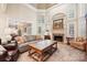 Bright living room with fireplace and hardwood floors at 7025 Willow Trace Ln, Weddington, NC 28104