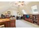 Bright home office with built-in shelving and large desk at 7025 Willow Trace Ln, Weddington, NC 28104