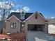 Brick house with a two-car garage and landscaping at 90 Silver Trace Ln # 90, Denver, NC 28037