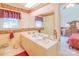 Bright bathroom with double sinks, a large mirror and a window that provides great light at 1405 Northcrest Dr, Albemarle, NC 28001