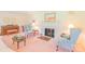 Bright living room features a fireplace, piano, and comfortable seating at 1405 Northcrest Dr, Albemarle, NC 28001