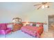 Bright main bedroom features a ceiling fan, dresser, and a comfortable bed at 1405 Northcrest Dr, Albemarle, NC 28001