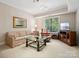 Spacious basement Gathering room with comfy seating at 418 Sebring Ct, Belmont, NC 28012