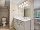 Basement bathroom with toilet, shower, and vanity at 418 Sebring Ct, Belmont, NC 28012