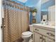 Clean bathroom with shower/tub combo and patterned curtain at 418 Sebring Ct, Belmont, NC 28012