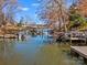Several boat docks on calm lake water at 418 Sebring Ct, Belmont, NC 28012
