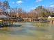 Lakefront view of calm water and boat docks at 418 Sebring Ct, Belmont, NC 28012