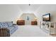 Spacious bonus room with a piano and TV at 418 Sebring Ct, Belmont, NC 28012