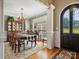 Elegant dining room with large table and chandelier at 418 Sebring Ct, Belmont, NC 28012