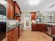 Spacious kitchen with an island, ample cabinetry, granite countertops, and stainless steel appliances at 418 Sebring Ct, Belmont, NC 28012