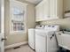 Laundry room with washer, dryer, and utility sink at 418 Sebring Ct, Belmont, NC 28012
