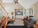 Two-story living room with fireplace and high ceilings at 418 Sebring Ct, Belmont, NC 28012