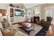 Living area with fireplace, built-in shelving and high ceilings at 418 Sebring Ct, Belmont, NC 28012
