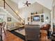 Open living room with high ceilings, fireplace and built-ins at 418 Sebring Ct, Belmont, NC 28012