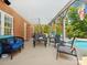 Brick patio with wicker furniture and pool view at 418 Sebring Ct, Belmont, NC 28012