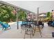 Covered patio area overlooking the pool at 418 Sebring Ct, Belmont, NC 28012