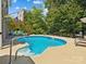 Inviting kidney-shaped pool with lounge chairs at 418 Sebring Ct, Belmont, NC 28012