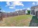 Spacious backyard with wooden fence and grassy area at 14949 Holbrooks Rd, Huntersville, NC 28078