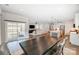 Dining area with a dark wood table, perfect for Gathering meals at 14949 Holbrooks Rd, Huntersville, NC 28078