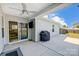 Covered patio with grilling area and sliding glass doors at 14949 Holbrooks Rd, Huntersville, NC 28078