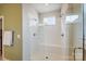 Large walk-in shower with a built-in seat and glass enclosure at 14949 Holbrooks Rd, Huntersville, NC 28078