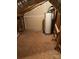 The unfinished attic space contains the home's hot water heater at 19307 Beaufain St, Cornelius, NC 28031