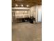 Unfinished basement space with workbench and ample storage at 19307 Beaufain St, Cornelius, NC 28031