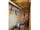 Unfinished storage area with exposed insulation and tools at 19307 Beaufain St, Cornelius, NC 28031