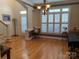Dining area with hardwood flooring and bright natural light at 19307 Beaufain St, Cornelius, NC 28031