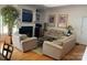 Cozy living room with hardwood floors, fireplace, and comfortable seating at 19307 Beaufain St, Cornelius, NC 28031