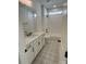 Bathroom with white vanity, patterned flooring and bathtub at 609 Hops Aly, Fort Mill, SC 29715