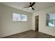 Spacious bedroom with ceiling fan and large windows at 609 Hops Aly, Fort Mill, SC 29715