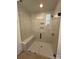 Large walk-in shower with built-in bench and glass enclosure at 609 Hops Aly, Fort Mill, SC 29715