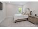 Comfortable bedroom with soft carpet, neutral paint, and a decorative headboard at 4861 Blanchard Way, Charlotte, NC 28226