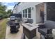 Outdoor patio featuring stylish furniture, a grill, and access to the indoors at 4861 Blanchard Way, Charlotte, NC 28226