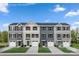 Four townhouses with attached garages and front yards at 5235 Stevedore Way, Charlotte, NC 28269