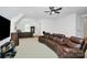 Spacious living room with a bar and curved sofa at 6178 Chimney Bluff Rd, Lancaster, SC 29720