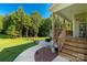 Wooden deck with stairs leading to a patio at 5051 Oxbow Run Ln, Clover, SC 29710