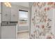 Bathroom with granite vanity and floral shower curtain at 5051 Oxbow Run Ln, Clover, SC 29710