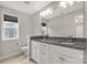 Bathroom with double vanity, granite countertop, and tiled floor at 5051 Oxbow Run Ln, Clover, SC 29710