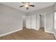 Bedroom with wood floors and an ensuite bathroom at 5051 Oxbow Run Ln, Clover, SC 29710