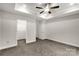 Main bedroom with walk-in closet and ceiling fan at 5051 Oxbow Run Ln, Clover, SC 29710